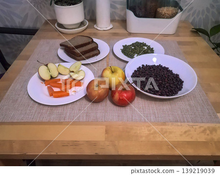 Healthy Raw Food Assortment on Wooden Table Healthy Raw Food Assortment on Wooden Table 139219039