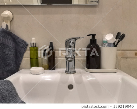 Modern Bathroom Sink with Toiletries and Skincare 139219040