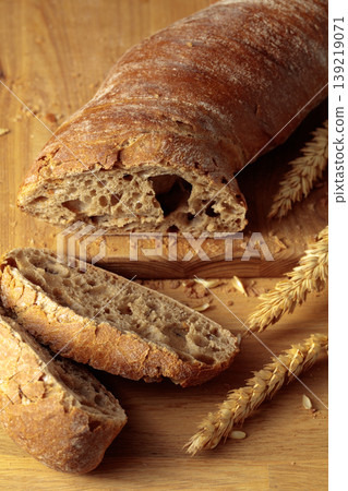 Ciabatta on a wooden table. Ciabatta on a wooden table. 139219071
