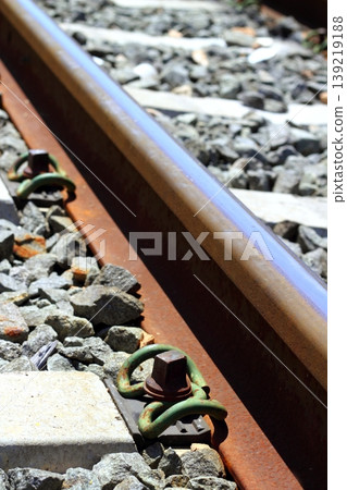 iron rusty train railway detail over dark stones iron rusty train railway detail over dark stones 139219188