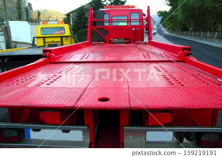 Tow car truck red rear view perspective platform Tow car truck red rear view perspective platform 139219191