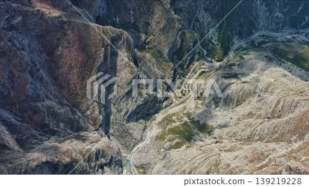 Mountain canyon with rocky cliffs and green forest Mountain canyon with rocky cliffs and green forest 139219228