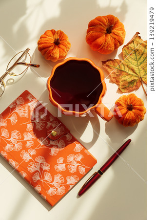 Autumn Flat Lay with Tea Mug, Pumpkins and Seasonal Decor Autumn Flat Lay with Tea Mug, Pumpkins and Seasonal Decor 139219479