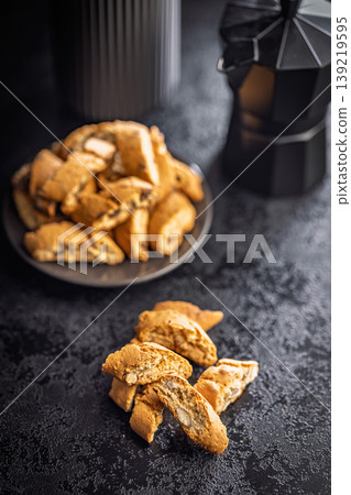 Grissini. Stacked Almond Biscotti Cookies Close-Up With Rustic Texture for Coffee, Dessert and Breakfast Treats Grissini. Stacked Almond Biscotti Cookies Close-Up With Rustic Texture for Coffee, Dessert and Breakfast Treats 139219595