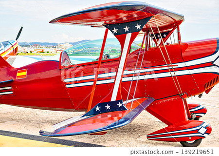 Airplane, red light aerobatic biplane. Air shows Airplane, red light aerobatic biplane. Air shows 139219651