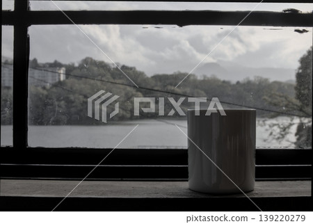 Coffee time by the window, a tranquil scene after the rain, relaxation, background material, horizontal shot Coffee time by the window, a tranquil scene after the rain, relaxation, background material, horizontal shot 139220279