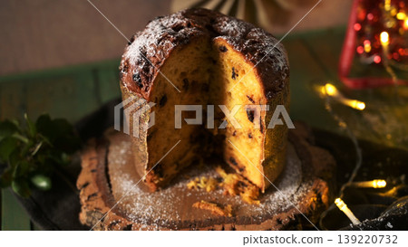 Horizontal Moody Shot of Panettone Sliced and Dusted with Powdered Sugar Horizontal Moody Shot of Panettone Sliced and Dusted with Powdered Sugar 139220732