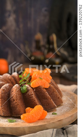Orange Citrus Bundt Cake with Fresh Tangerine Slices and Mint Orange Citrus Bundt Cake with Fresh Tangerine Slices and Mint 139220762