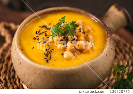 Creamy Pumpkin Soup with Roasted Chickpeas and Black Sesame Seeds 139220775