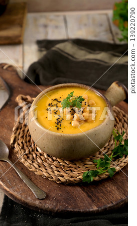 Creamy Chickpea and Vegetable Soup Topped with Black Sesame Seeds and Parsley Creamy Chickpea and Vegetable Soup Topped with Black Sesame Seeds and Parsley 139220790
