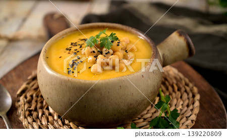 Creamy Chickpea and Vegetable Soup Topped with Black Sesame Seeds and Parsley Creamy Chickpea and Vegetable Soup Topped with Black Sesame Seeds and Parsley 139220809
