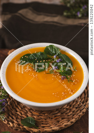Creamy Pumpkin Soup with Spinach and Sesame Seeds 139220842