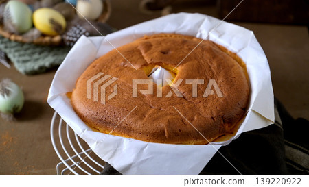 Freshly Baked Easter Sponge Cake on a Cooling Rack 139220922