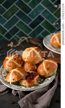 Freshly Baked Hot Cross Buns Served with Fruit Jam on Decorative Plate 139221134