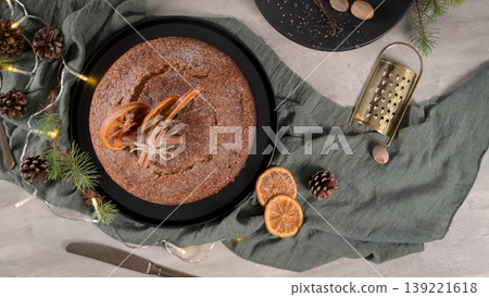 Christmas orange cake decorated with dried oranges 139221618