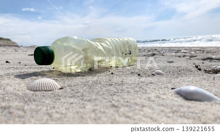 Plastic bottle at a coast Plastic bottle at a coast 139221655