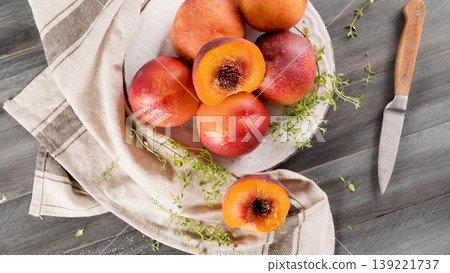 Plate with fresh nectarines 139221737