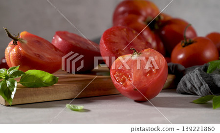 Tomatoes on rustic kitchen counter Tomatoes on rustic kitchen counter 139221860