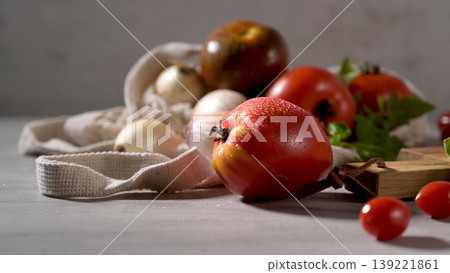 Tomatoes on rustic kitchen counter Tomatoes on rustic kitchen counter 139221861