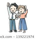 A man and a woman happily making a victory pose. 139221974