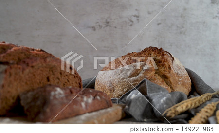 Artisan bread loaves on a rustic table 139221983