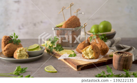 Cod dumplings or bolinhos de bacalhau 139222135