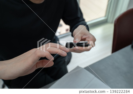 A man's hand clipping his nails A man's hand clipping his nails 139222284