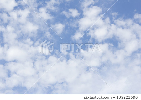 The sky is covered with fluffy clouds The sky is covered with fluffy clouds 139222596