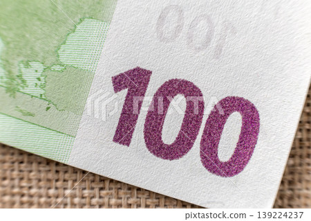 Money, busyness and finances concept. Detail part of banknote euro national currency bill. Symbol of wealth and prosperity. Money, busyness and finances concept. Detail part of banknote euro national currency bill. Symbol of wealth and prosperity. 139224237