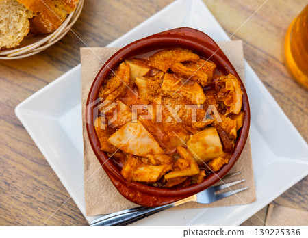 Beef tripe served with sauce in bowl Beef tripe served with sauce in bowl 139225336