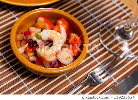 Salad of Spanish cuisine is Seafood Salpicon, made from chopped seafood and vegetables in dressing or sauce Salad of Spanish cuisine is Seafood Salpicon, made from chopped seafood and vegetables in dressing or sauce 139225554