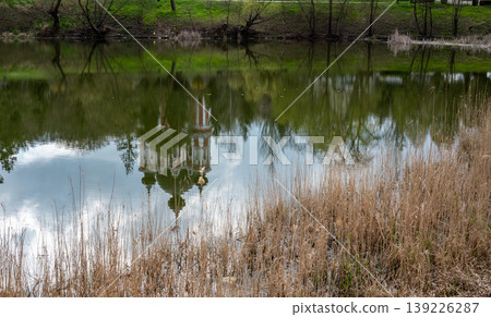 Panoramic View of Curchi Monastery Reflected in Peaceful Lake Water Panoramic View of Curchi Monastery Reflected in Peaceful Lake Water 139226287