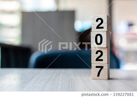 block 2027 text on table. Resolution, strategy, plan, goal, motivation, reboot, business and New Year holiday concepts block 2027 text on table. Resolution, strategy, plan, goal, motivation, reboot, business and New Year holiday concepts 139227081