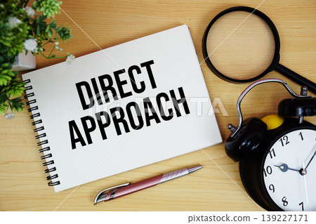 Direct Approach text written on notepad with alarm clock and magnifying glass flat lay on wooden background Direct Approach text written on notepad with alarm clock and magnifying glass flat lay on wooden background 139227171