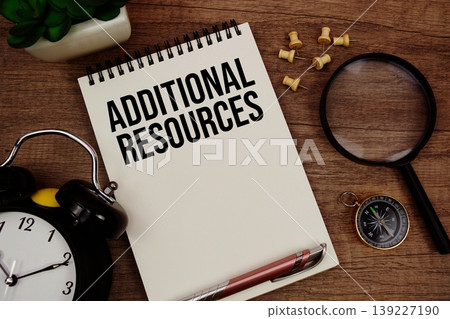 Additional Resources text written on notepad with alarm clock, compass and magnifying glass flat lay on wooden background Additional Resources text written on notepad with alarm clock, compass and magnifying glass flat lay on wooden background 139227190