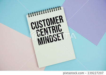 Customer Centric Mindset text written on notepad flat lay on multicolor pastel background Customer Centric Mindset text written on notepad flat lay on multicolor pastel background 139227207
