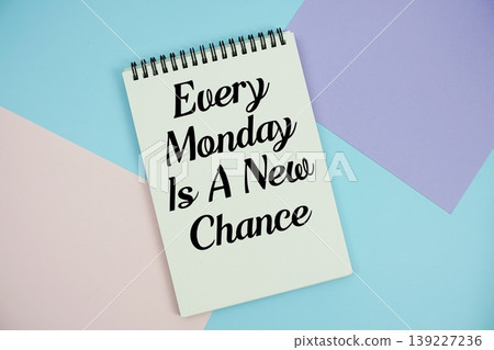 Every Monday Is A New Chance text written on notepad flat lay on multicolor pastel background Every Monday Is A New Chance text written on notepad flat lay on multicolor pastel background 139227236