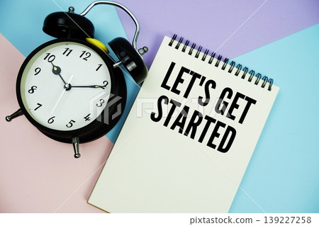 Let's Get Started text written on notepad with alarm clock flat lay on multicolor pastel background Let's Get Started text written on notepad with alarm clock flat lay on multicolor pastel background 139227258
