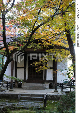 A scene from the grounds of Honen-in Temple at dusk in autumn. A scene from the grounds of Honen-in Temple at dusk in autumn. 139227396