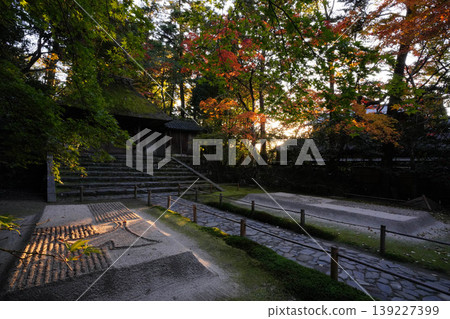 A scene from the grounds of Honen-in Temple at dusk in autumn. 139227399