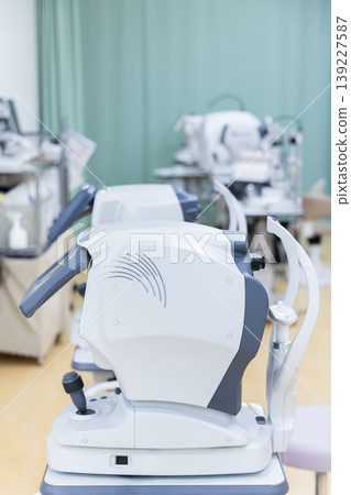 Close-up of an eye examination device (autorefractometer) at an ophthalmology clinic. Close-up of an eye examination device (autorefractometer) at an ophthalmology clinic. 139227587