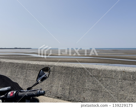 Beautiful sand patterns appearing on the tidal flats and touring scenery Beautiful sand patterns appearing on the tidal flats and touring scenery 139229173