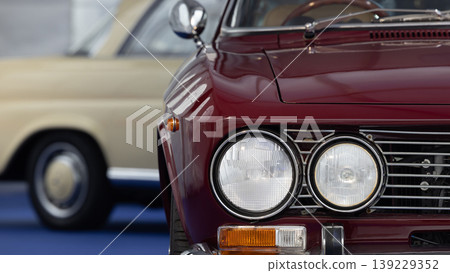 Headlights on classic car, Vintage car headlight, Classic retro car with close-up on headlight. 139229352