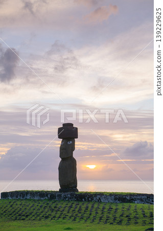 Peaceful moai statue standing on easter island chile during serene sunset 139229625