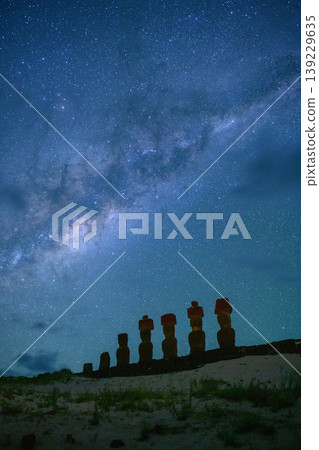 Serene moai statue standing at easter island chile under night sky Serene moai statue standing at easter island chile under night sky 139229635