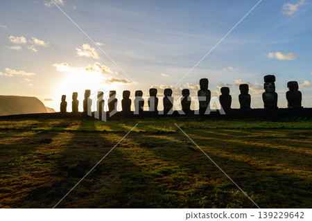 Peaceful moai statue standing in easter island chile during sunset 139229642