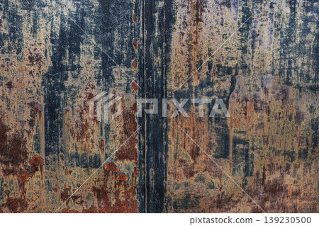 The iron exterior wall develops a mottled pattern due to corrosion caused by aging. 139230500