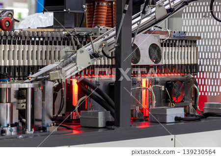 Automatic glass bottle inspection machine, Automation machine in modern factory technology demonstration bottles in the industry, High speed inspection. 139230564
