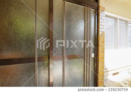 Entrance sliding door of a Japanese house from the Showa era Entrance sliding door of a Japanese house from the Showa era 139230734