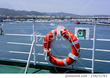 Cruise white boat handrail in blue Ibiza sea Cruise white boat handrail in blue Ibiza sea 139231761